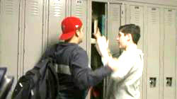 shot of one student grabbing another student's arm